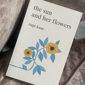 The Sun and Her Flowers Book